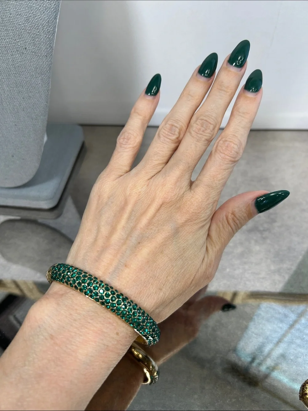 Gold Bangle Bracelet with Emerald Green Crystals
